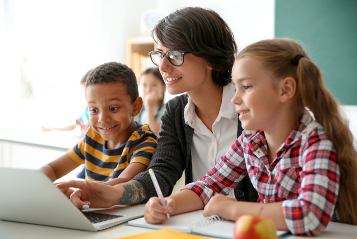 Teacher with students