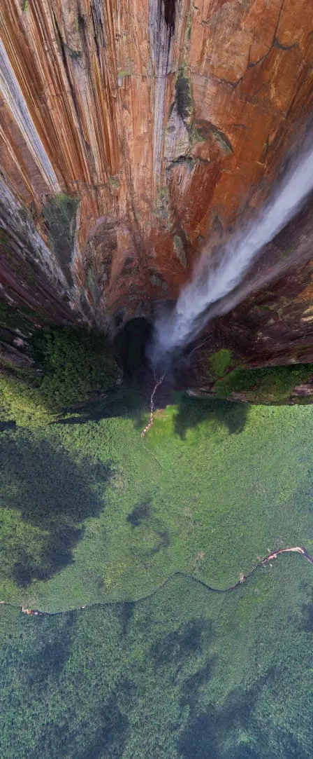 A bird's eye view of a tropical waterfall.