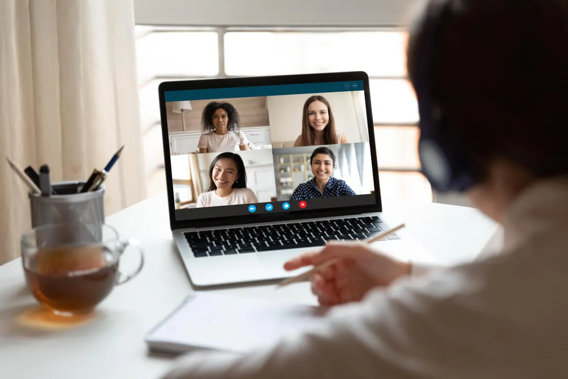 A group of students doing a group video chat together.