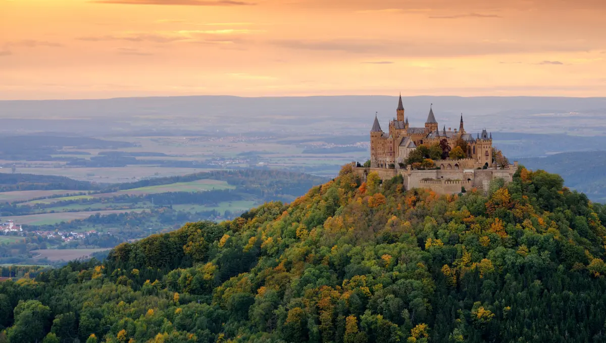 A castle on a hilltop in the distance